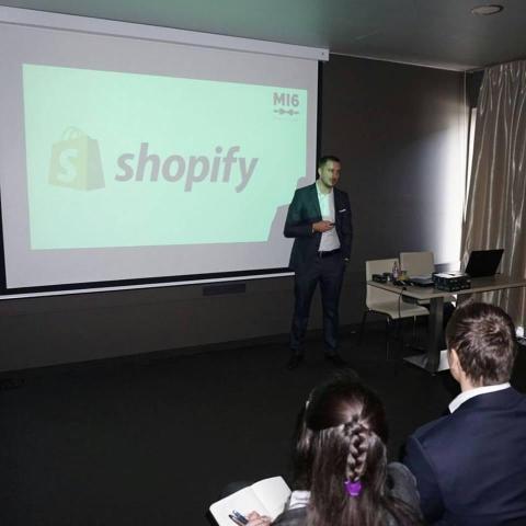 Denis Gorican giving a talk on online sales and Shopify, Maribor 2017